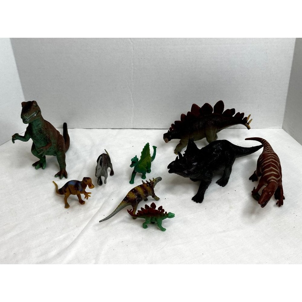 Lot of Nine Dinosaurs different sizes kinds Baryonyx Deinonychus Stegosaurus
